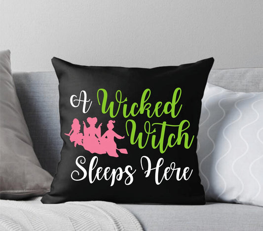 A Wicked Witch Sleeps Here Green and Pink Throw Pillow